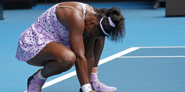 Serena Williams of the U.S. reacts as she plays China's Wang Qiang in their third round singles match at the Australian Open tennis championship in Melbourne, Australia, Friday, Jan. 24, 2020. (AP Photo/Lee Jin-man)