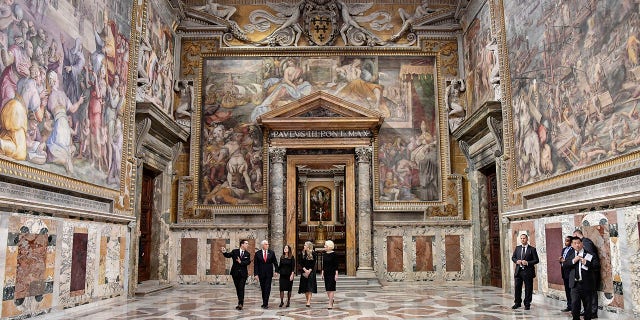 U.S. Vice President Mike Pence, second from left, and part of his delegation are given a private tour of the Vatican after his private audience with Pope Francis, at the Vatican, Friday, Jan. 24, 2020. (Associated Press)