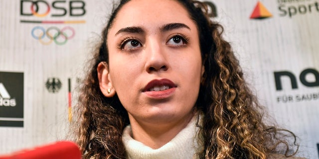 Iranian taekwondo athlete Kimia Alizadeh speaks to the media at a press conference in Luenen, Germany on Friday. Iran's only female Olympic medalist fled from the Islamic Republic and said she wants to compete for Germany. (AP Photo/Martin Meissner)
