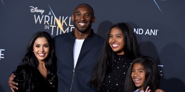 ​​​​​​​Vanessa Bryant, left, Kobe Bryant, Natalia Bryant and Gianna Maria-Onore Bryant are seen in Los Angeles, Feb. 26, 2018, nearly two years before Kobe and Gianna Bryant died in a helicopter crash on Jan. 26, 2020. (Associated Press)
