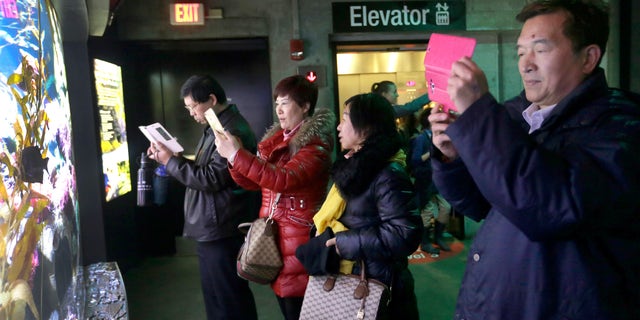 With tens of millions of Chinese ordered to stay put and many others opting to avoid travel as the new coronavirus spreads, tourism around the global took a heavy hit during one of the biggest travel seasons, the Lunar New Year. (AP Photo/Elise Amendola, File)
