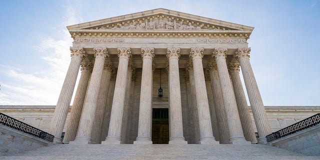 Thought the Supreme court is not doing its business in person during the pandemic, it's been called on multiple times to rule on efforts to halt states' coronavirus restrictions. (AP Photo/J. Scott Applewhite)