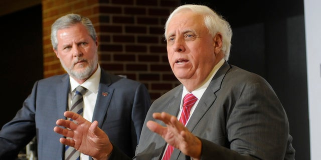 Jerry Falwell Jr. and Jim Justice, Governor of West Virginia. (Ron Agnir/The Journal via AP)