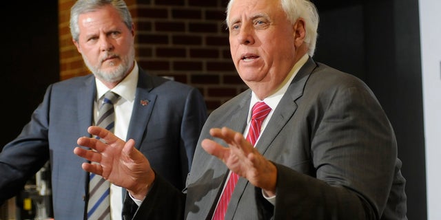 Jerry Falwell Jr. and Jim Justice, Governor of West Virginia. (Ron Agnir/The Journal via AP)