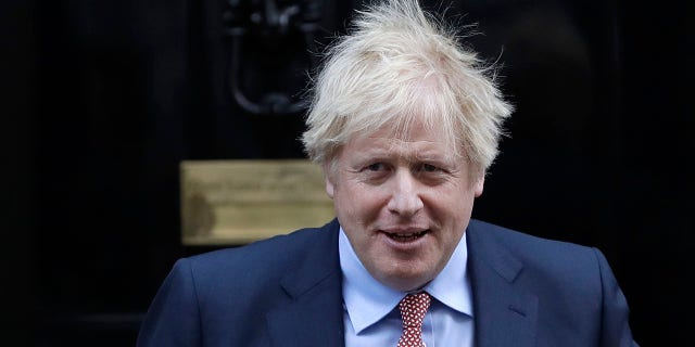 Britain's Prime Minister Boris Johnson leaves 10 Downing Street to attend the weekly session of Prime Ministers Questions in Parliament in London, Wednesday, Jan. 29, 2020.  (AP Photo/Kirsty Wigglesworth)