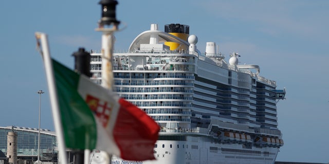 Passengers are being kept on board pending check to determine the type of virus. (AP Photo/Andrew Medichini)