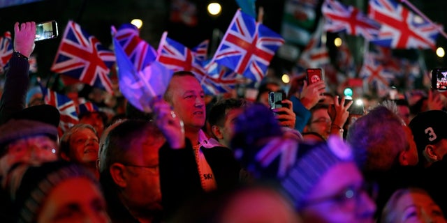 Brexit supporters gather during a rally in London on Friday. (AP Photo/Frank Augstein)