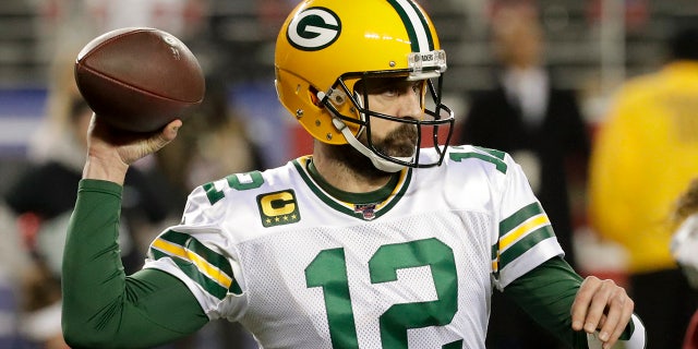 Green Bay Packers quarterback Aaron Rodgers passing during the second half of the NFC Championship game Sunday. (AP Photo/Matt York)