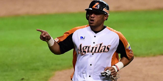 Alex Romero of Aguilas del Zulia from Venezuela celebrates after scoring against Alazanes de Granma from Cuba during their Caribbean Baseball Series at the Tomateros stadium in Culiacan, Sinaloa State, Mexico, on Feb. 4, 2017. (RONALDO SCHEMIDT/AFP via Getty Images)