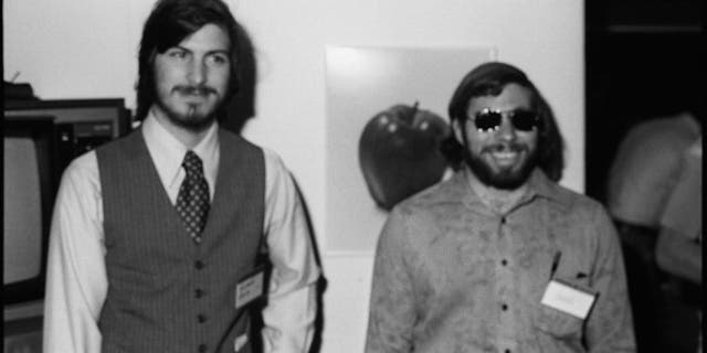 Portrait of American businessmen and engineers Steve Jobs (left) and Steve Wozniak, co-founders of Apple Computer Inc, at the first West Coast Computer Faire, where the Apple II computer was debuted, in Brooks Hall, San Francisco, April 16th or 17th, 1977. (Getty Images)
