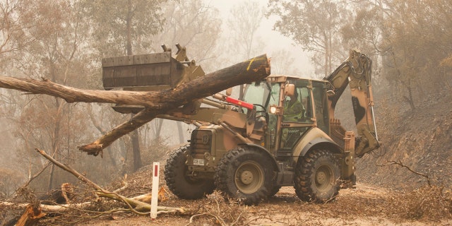 Australia's government on Monday said it was willing to pay "whatever it takes" to help communities recover from deadly wildfires that have ravaged the country.