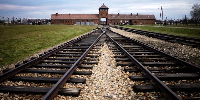 Railway tracks lead to the former Nazi death camp of Auschwitz Birkenau in Oswiecim, Poland, on Dec. 7, 2019. (AP Photo/Markus Schreiber, File)
