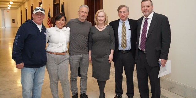 Jon Stewart, center, recently met with Senator Kirsten Gilbrand, center, along with defenders Jon Vail and Rosie Torres, left, Burn Pits 360 founder.