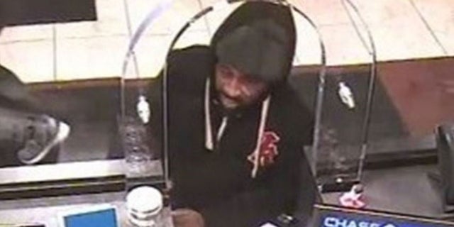Cops have identified the person in this image as accused bank robber Gerod Woodberry, 42. Woodberry turned himself in to authorities Friday. His release prompted criticism of a bail reform law that led to his earlier release. (New York City Police Department)
