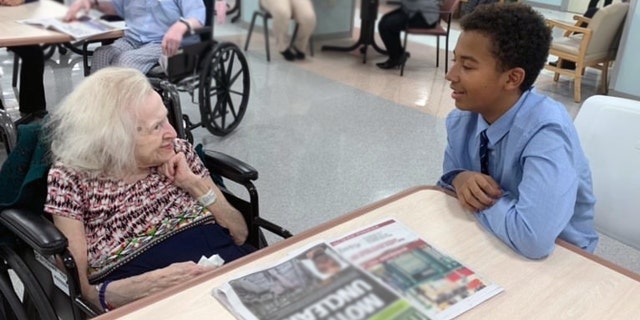 Hildegard, 94, talks with New York City middle schooler Basti Williams. The two became friends through their shared German heritage.