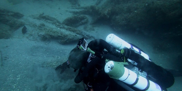 Michael Barnette searching for clues on the SS Cotopaxi wreck.