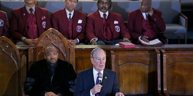 Presidential candidate Michael Bloomberg speaking during a service at the Vernon American Methodist Episcopal Church in Tulsa on Sunday, as the Rev. Robert Turner looked on. (AP Photo/Sue Ogrocki)