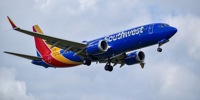 A Southwest airlines 737 max 8 landing at Ronald Regan National Airport(DCA) Arlington, Virginia, USA November 8th, 2018 Plane-Boeing 737 Max 8 Registration-n8704q Airport- DCA Photo Credit- Domonic Evaninia