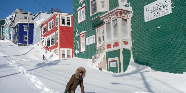 A resident makes their way through the snow in St. John's, Newfoundland on Saturday after a major blizzard hit the area.