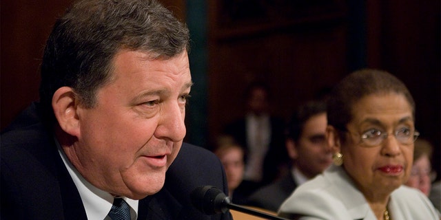 Rep. Chris Cannon, R-Utah, testifies as Del. Eleanor Holmes Norton, D-D.C., listens during the Senate Judiciary Committee hearing on "Ending Taxation without Representation: The Constitutionality of S.1257" on Wednesday, May 23, 2007. (Photo By Bill Clark/Roll Call/Getty Images)