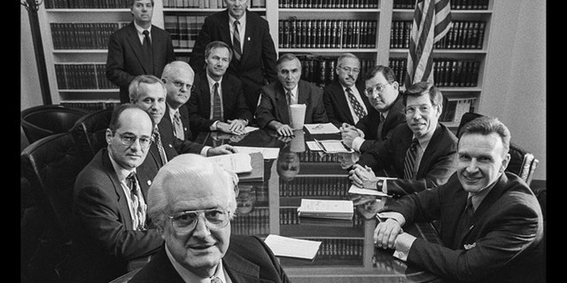 Twelve of the 13 Republican congressmen who managed the House Impeachment Trial of Bill Clinton gathered in a Committee Room on Feb. 12, 1999, the day the Senate voted to acquit Clinton on charges of perjury and obstruction of justice. Congressmen seated from left, in front Henry Hyde (R-Ill.); Charles Canady (R-FL); Steve Buyer (R-Ind.); Jim Sensenbrenner (R-Wis.); Lindsay Graham (R-S.C.); Asa Hutchinson (R-Ark.); Steve Chabot (R-Ohio); George Gekas (R-PA); Bob Barr (R-GA); Chris Cannon (R-Utah); Bill McCollum (R-FL); and Jim Rogan (R-Calif). Not pictured is Ed Bryant (R-Tenn.). (Photo by David Hume Kennerly/Getty Images)