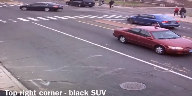 Bridgeport School Resource Officer Carlos Carmo Jr.can be seen running toward a vehicle as it rolled down a roadway as students were walking home from school.