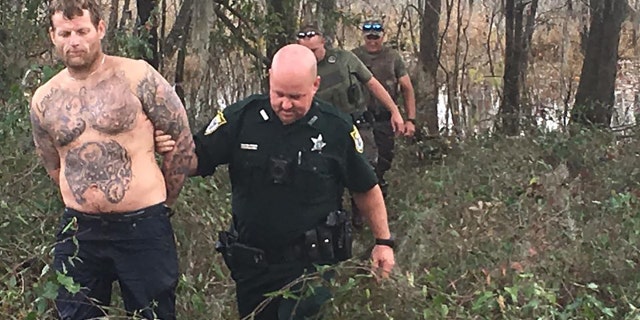 Booth was arrested and transported, still soaking wet, to the county jail, the sheriff's office said.