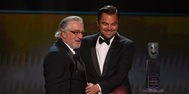 Leonardo DiCaprio, right, presents the lifetime achievement award to Robert De Niro at the 26th annual Screen Actors Guild Awards at the Shrine Auditorium &amp; Expo Hall on Sunday, Jan. 19, 2020, in Los Angeles.