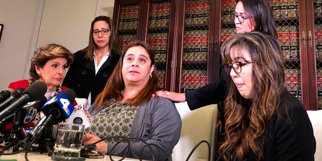 Attorney Gloria Allred, left, is seen with four Park Avenue Elementary School teachers at a Los Angeles news conference on Friday.