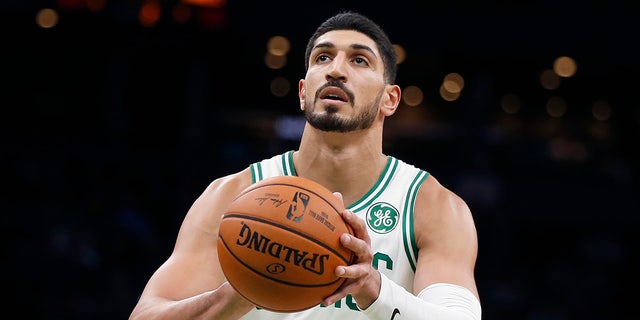 FILE - In this Sunday, Oct. 6, 2019 file photo, Boston Celtics' Enes Kanter plays against the Charlotte Hornets during the first half of a preseason NBA basketball game in Boston.
