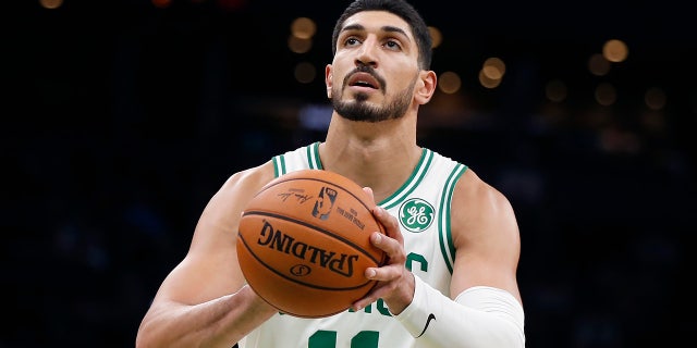 FILE - In this Sunday, Oct. 6, 2019 file photo, Boston Celtics' Enes Kanter plays against the Charlotte Hornets during the first half of a preseason NBA basketball game in Boston.