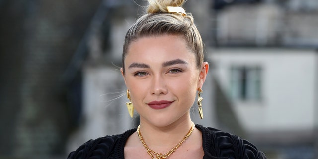 Florence Pugh said she believes her relationship with Zach Braff ‘bugs people’ because he's not the man the public would expect her to date. (Photo by Tim P. Whitby/Getty Images for Sony Pictures Releasing UK)