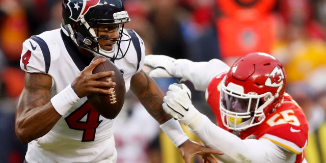 Houston Texans quarterback Deshaun Watson (4) scrambles under pressure from Kansas City Chiefs defensive end Frank Clark (55) during the second half of an NFL divisional playoff football game, in Kansas City, Mo., Sunday, Jan. 12, 2020.
