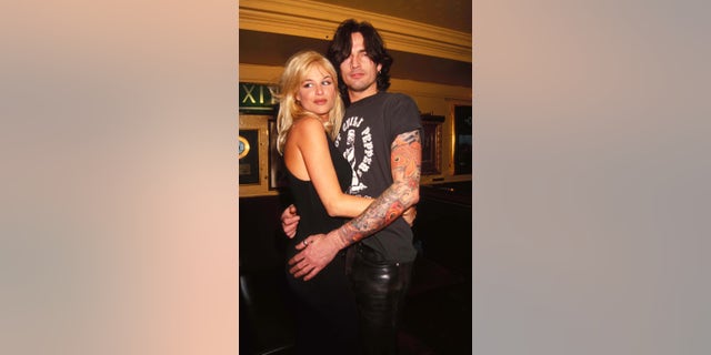 Tommy Lee of Motley Crue and then-girlfriend Bobbie Brown.
