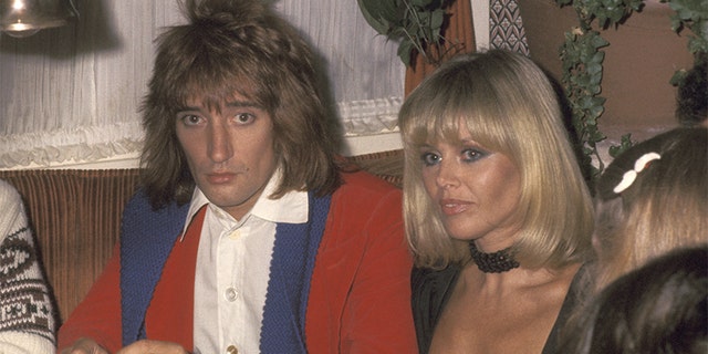 Rod Stewart and Britt Ekland at Carlos & Charlie's Restaurant in Los Angeles, California, circa 1977.