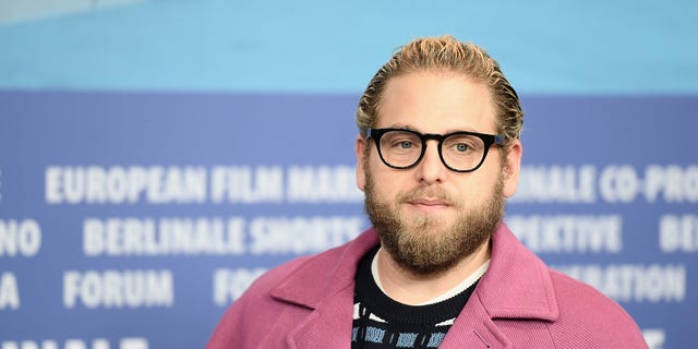 Jonah Hill opened up about his journey to self-love in an Instagram post while he clapped back at the Daily Mail for sharing photos of him surfing. (Matthias Nareyek/Getty Images)