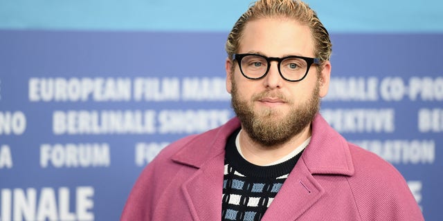 Jonah Hill opened up about his journey to self-love in an Instagram post as he applauded the Daily Mail for sharing photos of him surfing.  (Matthias Nareyek / Getty Images)