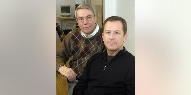 David Kaczynski, left, brother of the Unabomber, Ted Kaczynski, and Gary Wright, a Unabomber victim, pose during a break in a speaking engagement in Troy, New York, Tuesday, April 17, 2007.