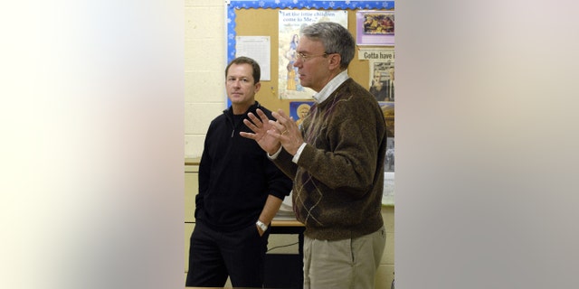 David Kaczynski, right, brother of the Unabomber, Ted Kaczynski, and Gary Wright, a Unabomber victim, speak to students in a classroom in Troy, New York, Tuesday, April 17, 2007.