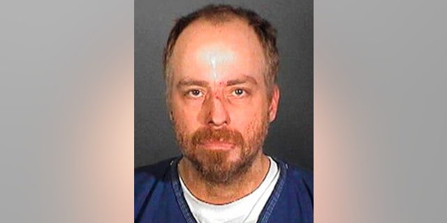 In this handout, American singer, actor, and television personality Leif Garrett in a mug shot following his arrest, US, circa 2005.