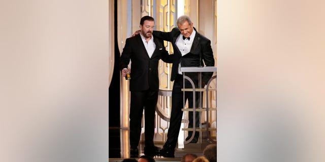 Host Ricky Gervais and presenter Mel Gibson speak onstage during the 73rd Annual Golden Globe Awards at The Beverly Hilton Hotel on January 10, 2016 in Beverly Hills, California. 