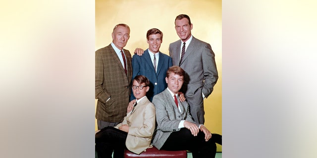 Fred MacMurray (right) stars as widowed aeronautical engineer Steve Douglas, raising his three sons with the help of William Demarest (left) as Uncle Charley., Don Grady (as Robbie Douglas-top center), Barry Livingstone (as Ernie Thompson Douglas -bottom left) and Stanley Livingstone (as Chip Douglas).