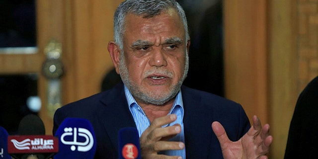 Leader of the Conquest Coalition and the Iran-backed Shi'ite militia Badr Organisation Hadi al-Amiri speaks during a news conference in Najaf, Iraq June 12, 2018. (REUTERS/Alaa al-Marjani)