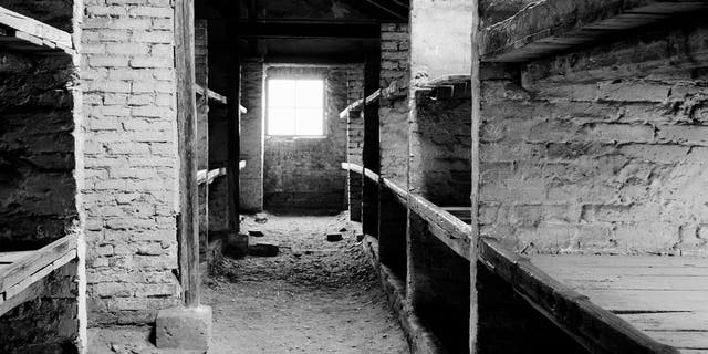 A view inside a prisoner barracks in the former Nazi death camp of Auschwitz Birkenau or Auschwitz II in Oswiecim, Poland. (AP Photo/Markus Schreiber)