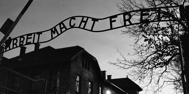 The main entrance at the former Nazi death camp of Auschwitz in Oswiecim, Poland, with the inscription, 'Arbeit Macht Frei', which translates into English as '