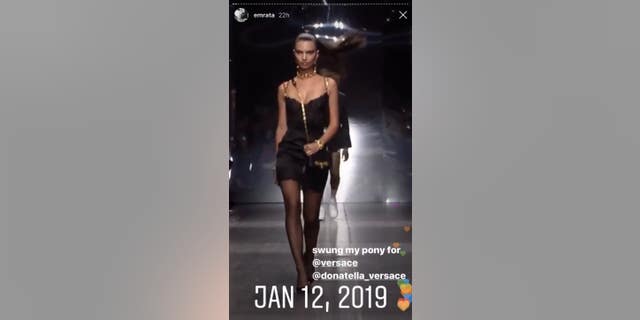 Emily Ratajkowski walks the runway for Versace.