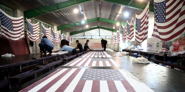A general views shows U.S. flags at a large flag factory which creates U.S. and Israeli flags for Iranian protesters to burn in Khomein City, Iran. 