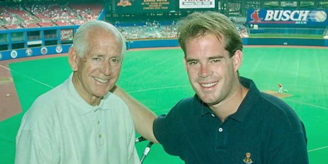 Joe Buck is seen with his father, legendary sportscaster Jack Buck, who died in 2002.