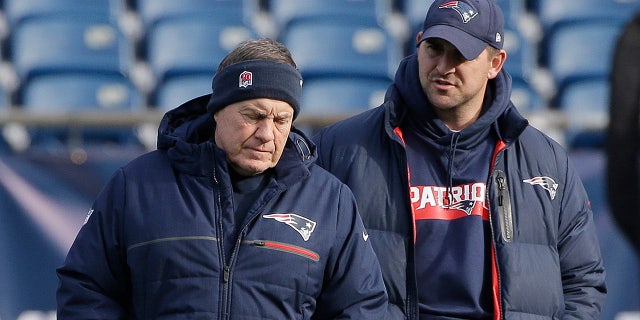 New England Patriots head coach Bill Belichick, left, speaks with special teams coach Joe Judge, right, during NFL football practice in Foxborough, Mass., in this Dec. 20, 2018, file photo. (AP Photo/Steven Senne)