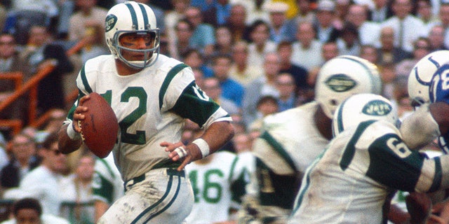 New York Jets' Joe Namath (12) returns to pass against the Baltimore Colts during Super Bowl III at the Orange Bowl, January 12, 1969 in Miami, Florida.